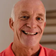 Candid representation of an elderly gentleman exhibiting renewed physical stamina and systemic wellness attributes.